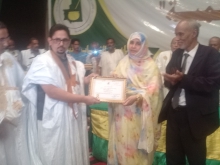 رئيس اتحاد الأدباء الموريتانيين ووزير الثقافة خلال حفل انطلاقة المهرجان السنوي للاتحاد (الأخبار)