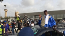 الرئيس السنغالي السابق عبد الله واد لدى عودته إلى داكار 10 يوليو 2017.