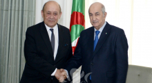 وزير الخارجية الفرنسي جان إيف لودريان مع الرئيس الجزائري عبد المجيد تبون